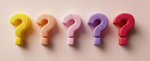 The colorful question marks symbolizing curiosity and inquiry in a playful design. photo