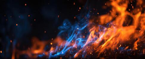 The Flames Dancing in a Colorful Display of Blue and Orange Light photo