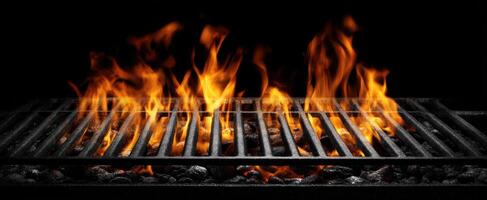 The Grill Flames Erupting from Charcoal in a Dark Background photo
