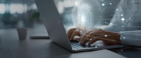 The laptop displaying digital security with hands typing in a modern workspace. photo
