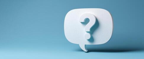 The White Question Mark Inside a Speech Bubble on a Blue Background photo