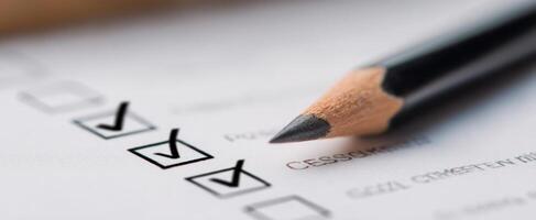 The checklist with a pencil ready for organized task completion. photo