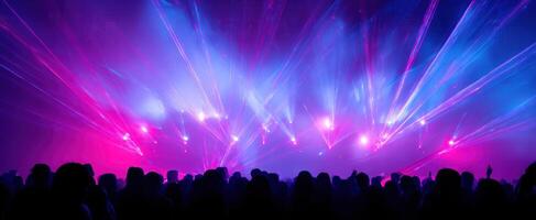 The captivating laser display lighting up the night sky at a concert. photo