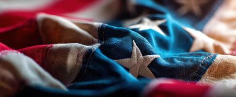 The American flag beautifully draped showcasing its rich colors and textures. photo