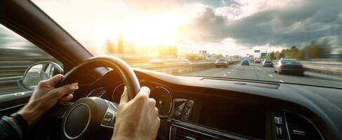 The driver's perspective on a scenic highway at sunset. photo