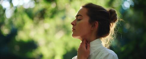 The serene woman enjoying tranquility in a lush green environment. photo