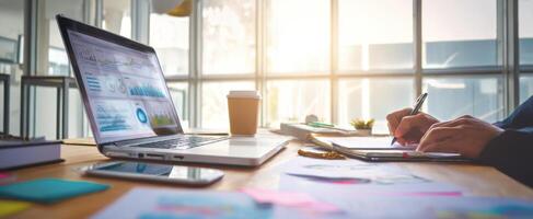 The modern workspace with a laptop and engaging productivity tools. photo