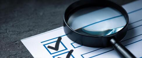 The Magnifying Glass Over a Checklist for Detailed Verification and Analysis. photo