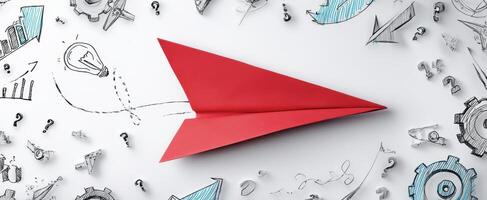 The red paper airplane soaring among innovative business sketches and ideas. photo