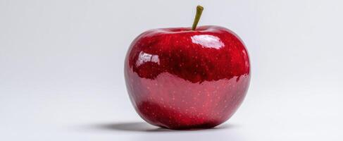 The vibrant red apple showcasing its glossy surface and natural beauty. photo