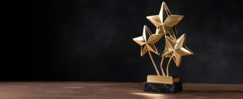 The elegant trophy featuring three golden stars on a dark background. photo