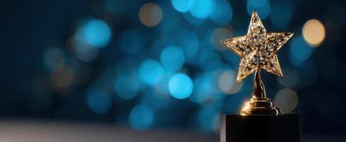 The gleaming star trophy shining against a dreamy bokeh background photo