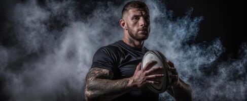 The athlete showcasing strength and intensity with a rugby ball in dramatic lighting. photo
