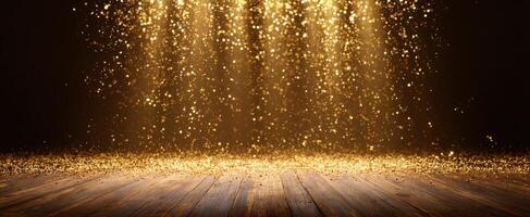 The dazzling display of golden glitter illuminating a wooden floor. photo