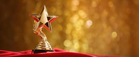 The golden star trophy symbolizing achievement and excellence in awards ceremonies. photo