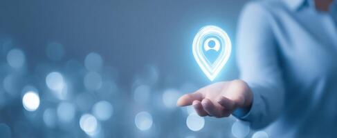 The Digital Location Marker Held by a Hand in a Futuristic Setting photo