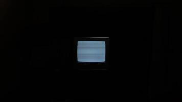Old analog television with flicker and noise in the screen video