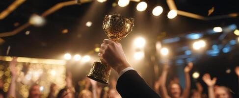 The trophy raised high in celebration during an exuberant awards ceremony. photo
