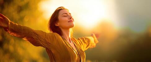 The woman embracing the warm sunlight in a serene outdoor setting. photo