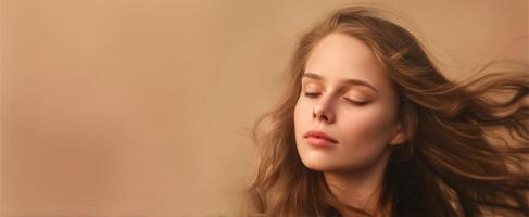 The serene beauty of a woman with flowing hair in a gentle breeze photo
