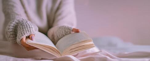 The serene moment of reading a book in a cozy setting. photo