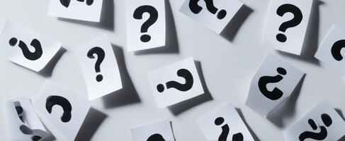 The collection of question marks symbolizing inquiry and curiosity in decision-making. photo