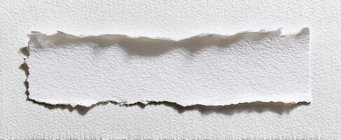 The Torn Edge of White Paper Against a Subtle Background for Creative Design photo