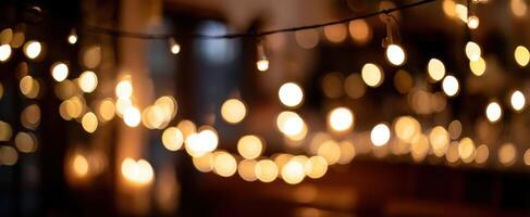 The enchanting glow of string lights creating a warm and festive ambiance. photo