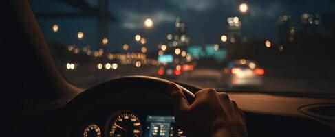 The nighttime drive through a vibrant city illuminated by bright lights. photo
