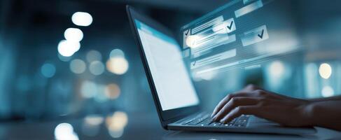 The laptop with a futuristic digital interface enhances modern productivity. photo