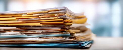 The Organized Chaos of Stacked Office Files and Documents photo
