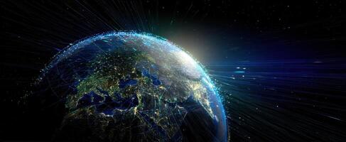 The Earth illuminated by city lights and cosmic rays in a vast universe. photo