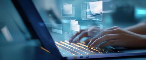 The hands typing on a laptop with digital file overlays in a modern workspace. photo
