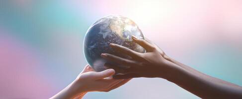 The hands of unity holding the earth together in harmony and love photo
