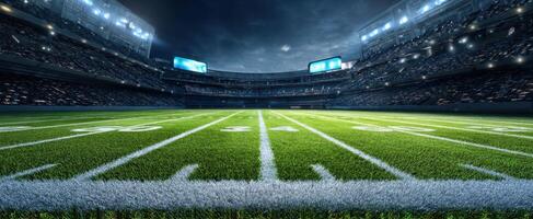 The football field illuminated under stadium lights during an exciting night game photo