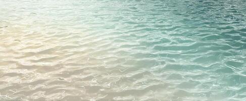 The gentle waves of a tranquil ocean surface reflecting sunlight. photo