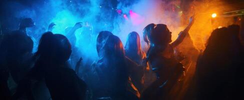 The vibrant energy of a lively club filled with dancing silhouettes. photo