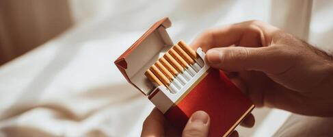 The elegant presentation of cigarettes from a classic red box. photo