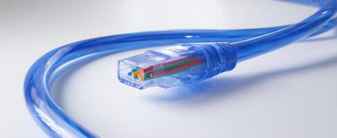 The blue ethernet cable showcasing an intricate connector detail on a sleek surface. photo
