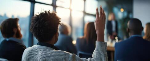 The audience engages with a speaker during an interactive business presentation. photo