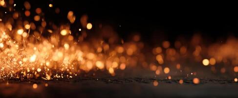 The mesmerizing dance of glowing sparks illuminating the dark background. photo
