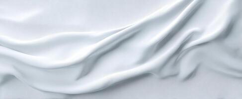 The elegant silk fabric creating soft waves and smooth textures. photo