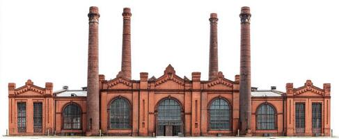 The striking faade of a historic red brick industrial power plant. photo