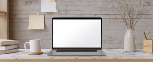 The sleek laptop on a stylish home office desk with minimalistic decor photo
