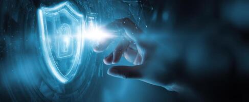 The glowing shield being accessed by a human hand in a digital environment. photo