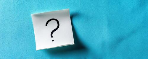 The question mark on a note symbolizing curiosity and inquiry. photo