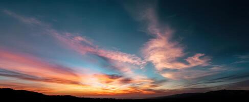 The stunning sunset painting the sky with vibrant colors and clouds. photo