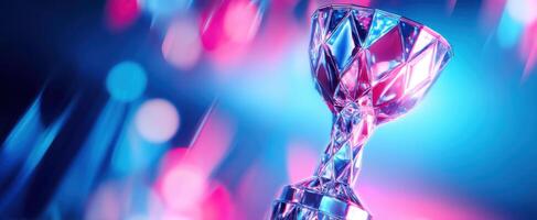 The shining trophy celebrating achievement amidst colorful lights and reflections photo