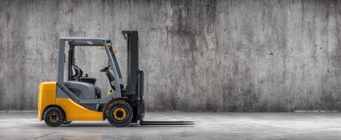 The industrial forklift parked against a textured concrete wall in a spacious warehouse photo