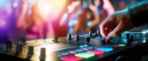 The DJ adjusting sound levels in a vibrant nightclub atmosphere photo